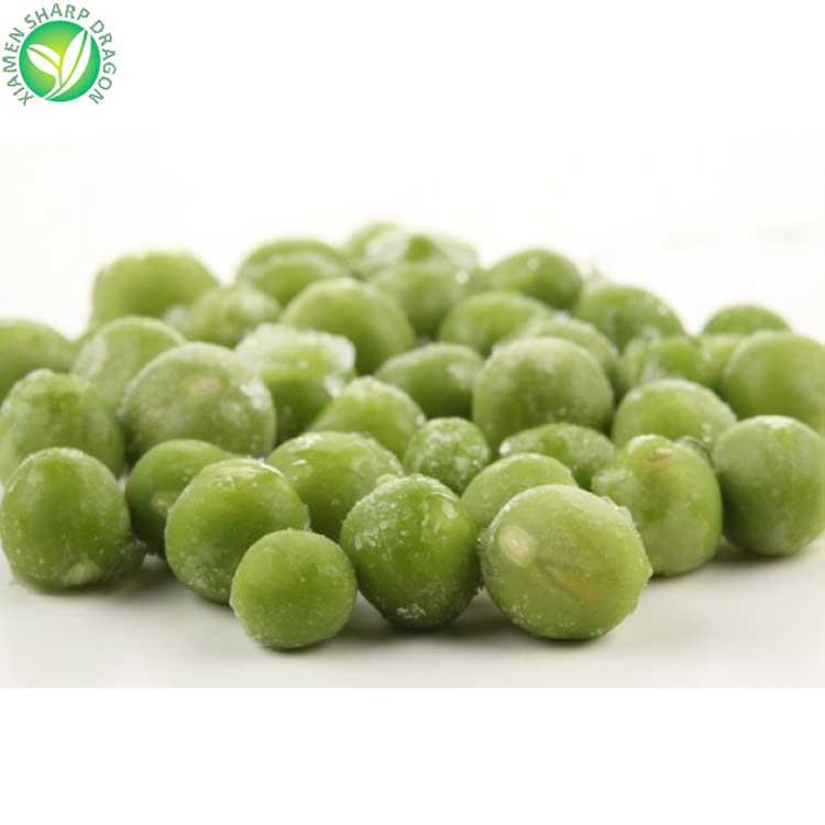 Frozen green peas with visible ice crystals Close-up of frozen green peas with a light coating of ice crystals
