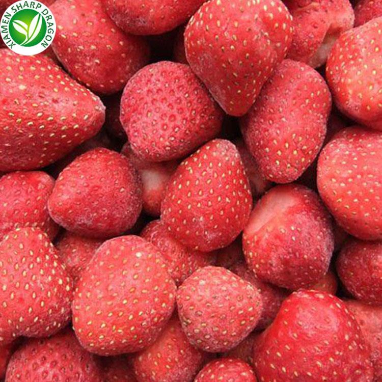 Whole frozen strawberries in their plain frozen form Whole frozen strawberries arranged for a close product view